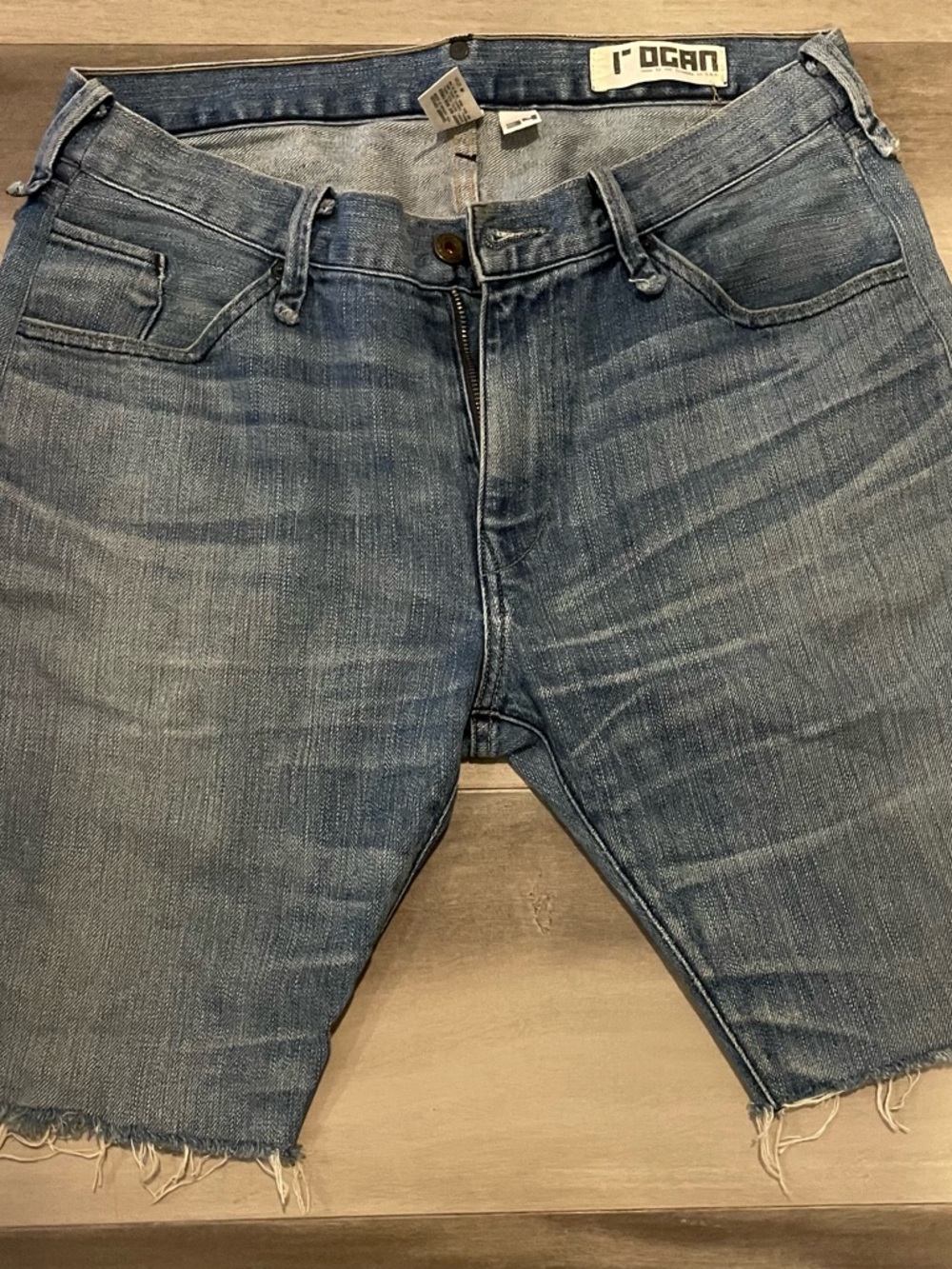 L'AGENCE Men's Distressed Denim Cutoff Shorts in Light Blue